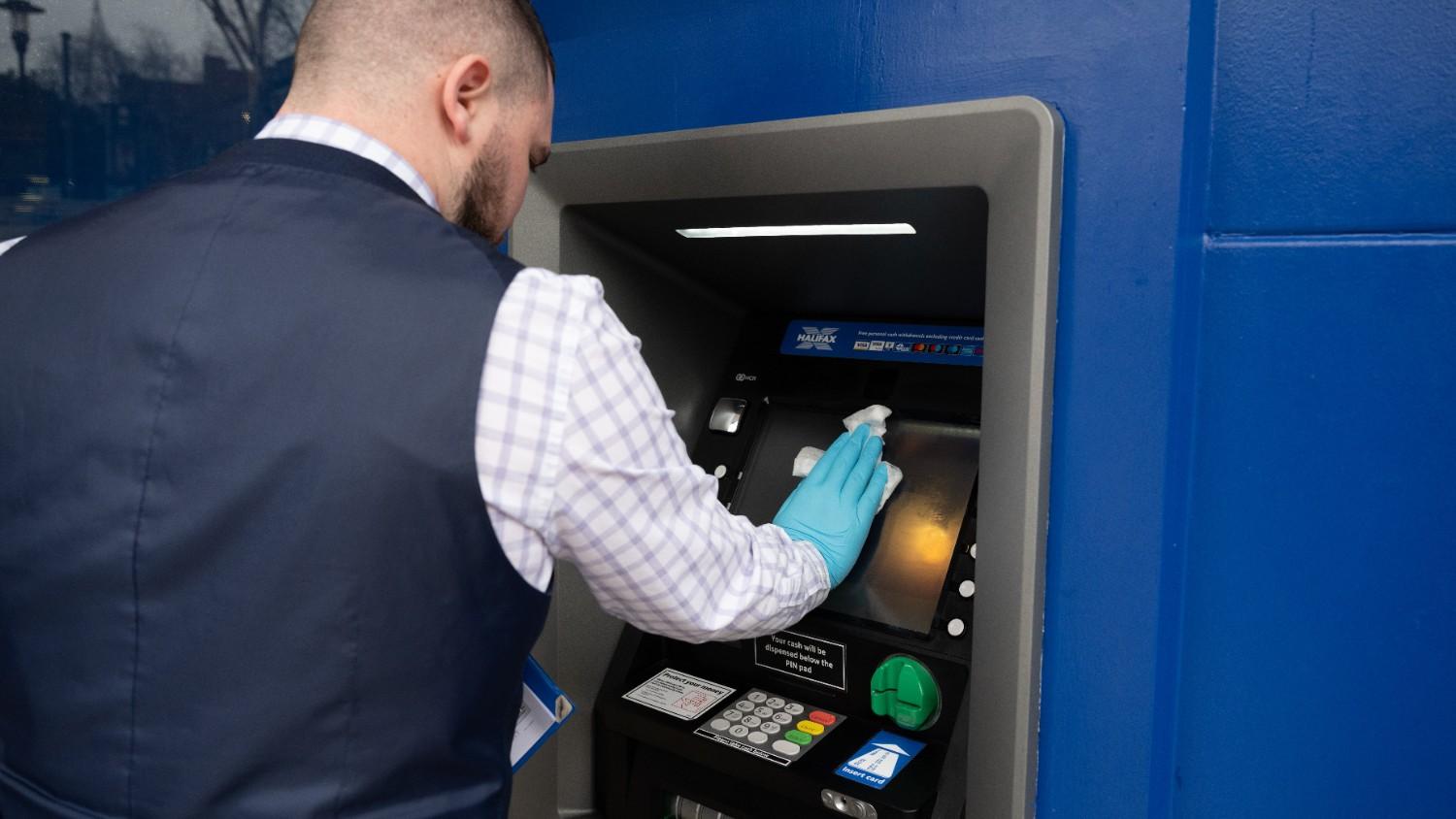 A Person From Brye A+ Cleaning Team Clean ATM.